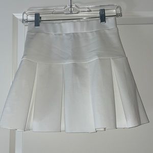 NEVER WORN Lioness tennis skirt, size 2